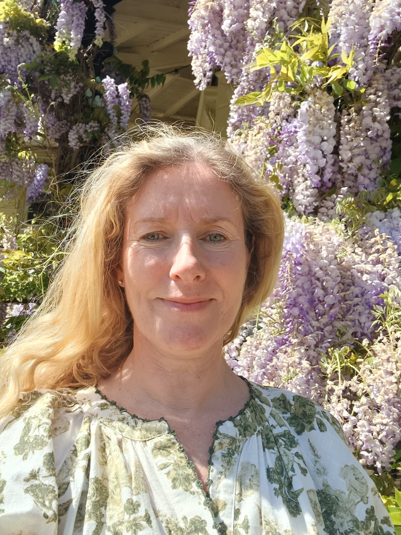 Katharine Gailard, Natural Fertility Specialist — photographed under wisteria